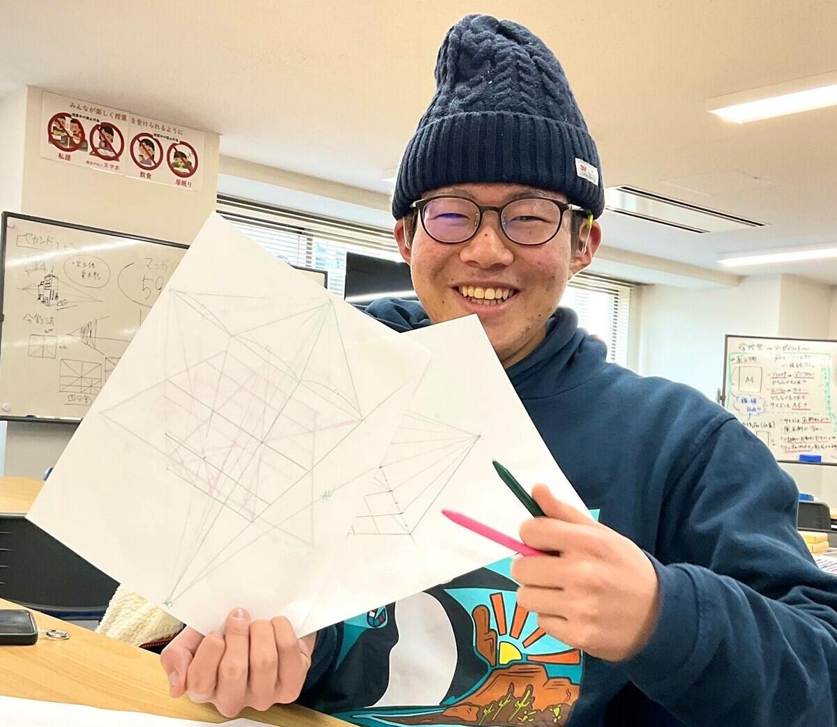 生徒と作品の写真