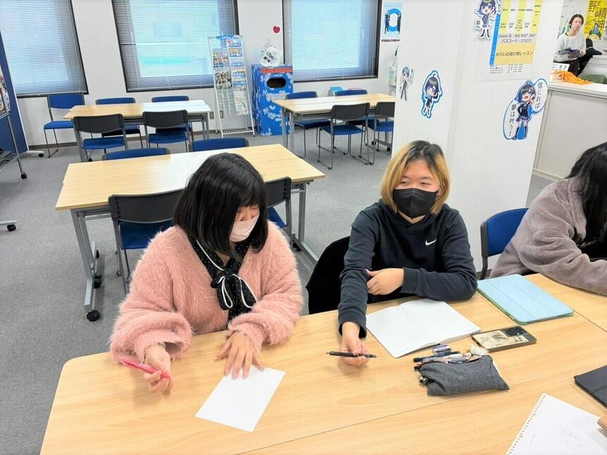 マイコーチとイラスト対決をしている様子