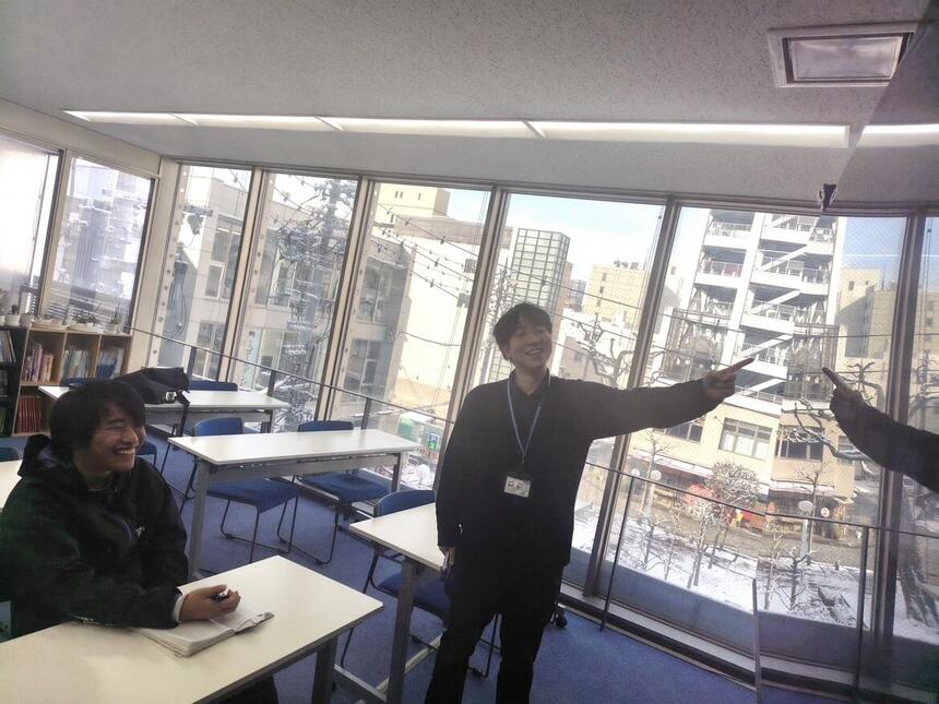 EX授業を受けているコーチと生徒