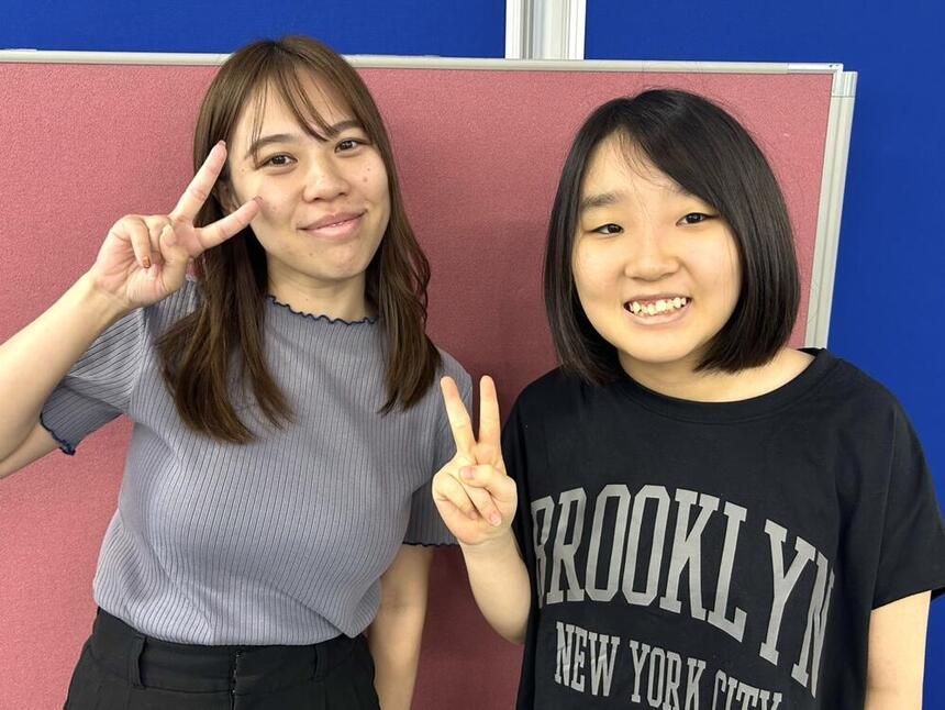 キャンパスでマイコーチ®と笑顔で写真に写るSさん