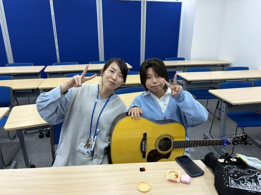 Mさんとマイコーチ®がみらいの架け橋レッスン®中に笑顔でツーショットを撮る様子