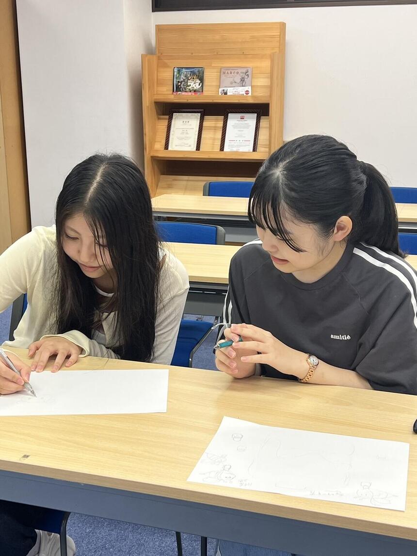 話し合いをする女子高生