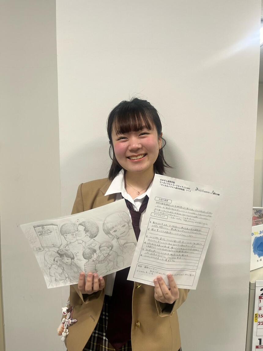 魂のこもったマンガ作品と笑顔の生徒