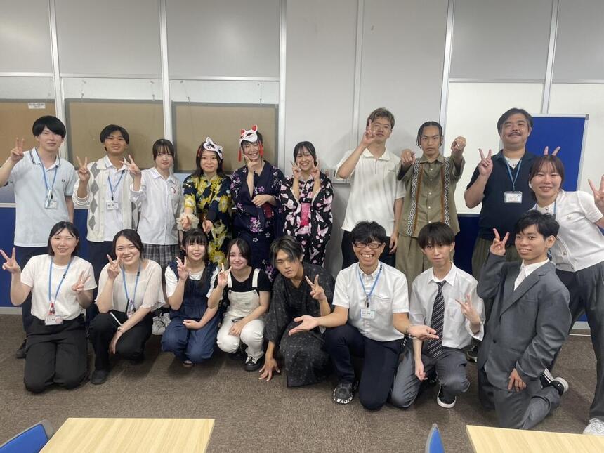 イベント実行委員の生徒とコーチとの写真